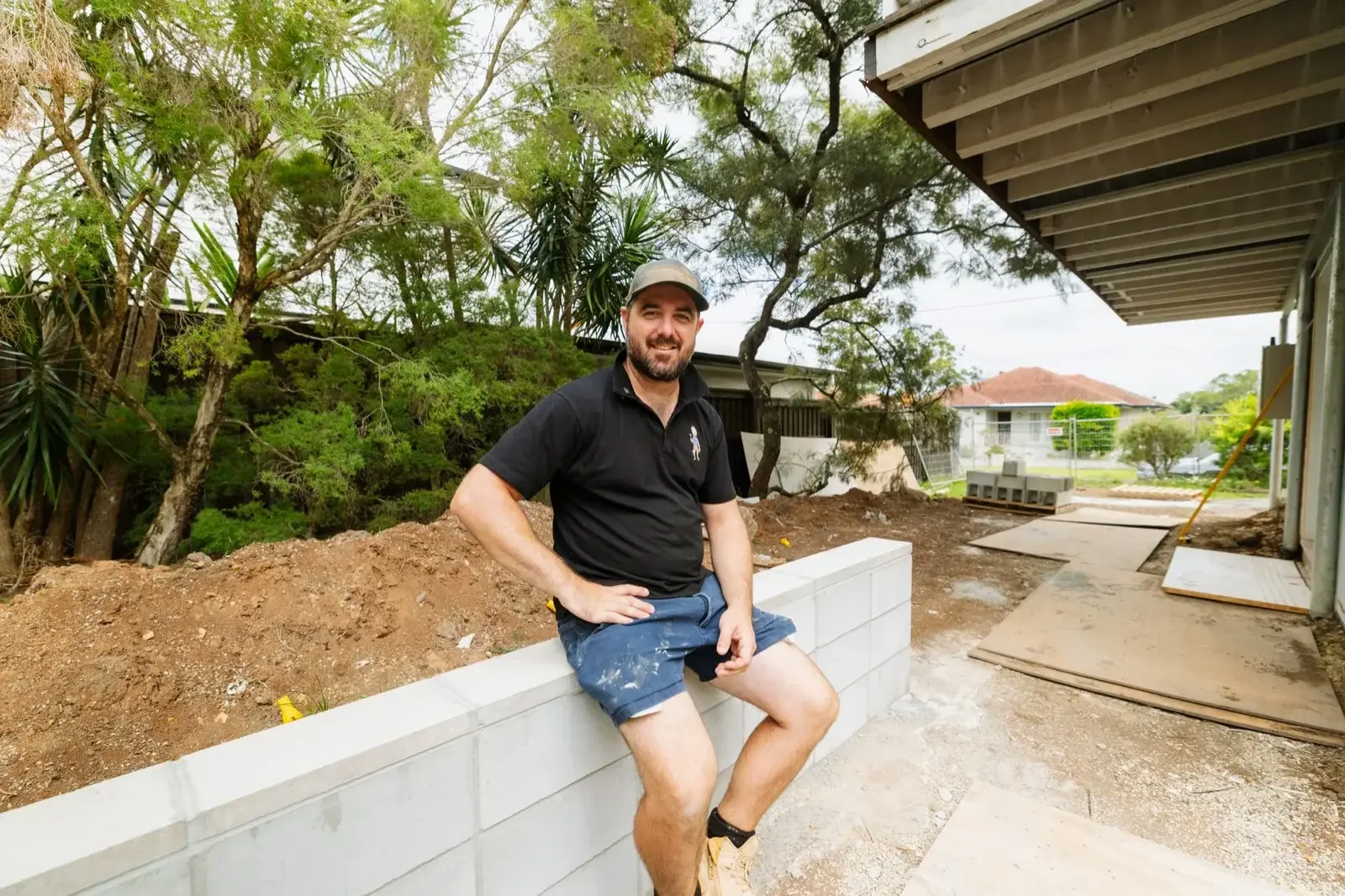 Tomas Farr inspecting a renovation site