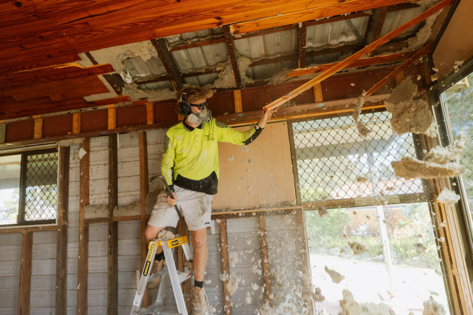Alfresco ceiling demolition debris cleared Brisbane