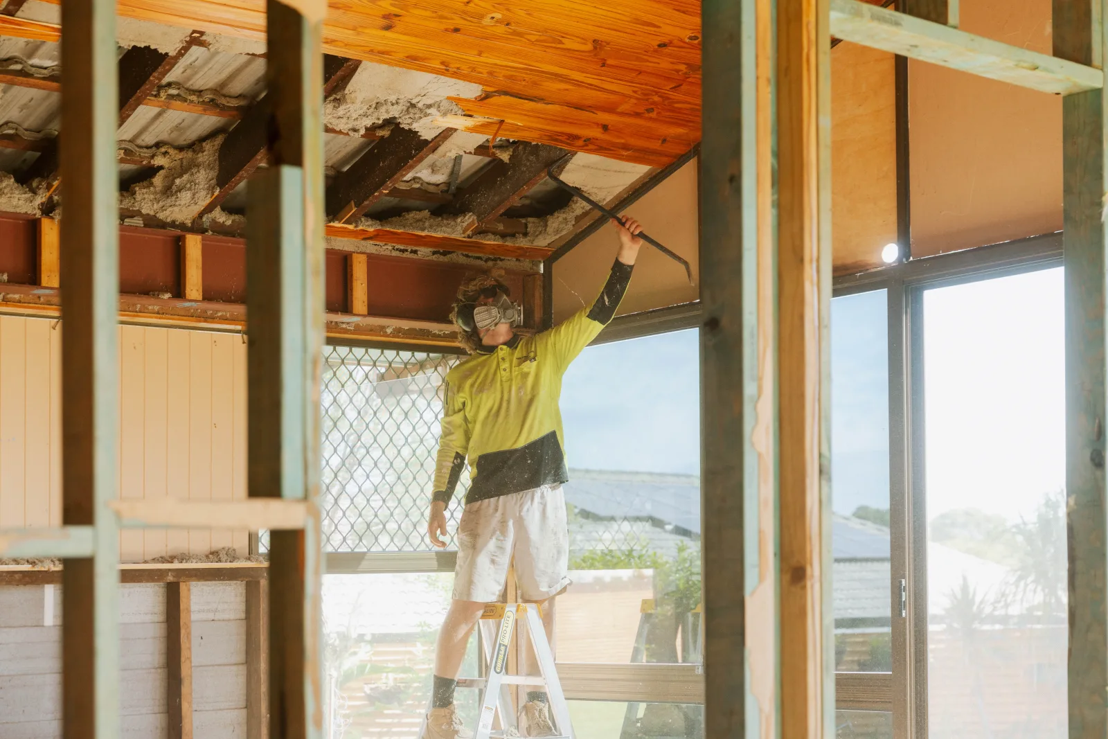 Tradesman doing alfresco ceiling work Brisbane