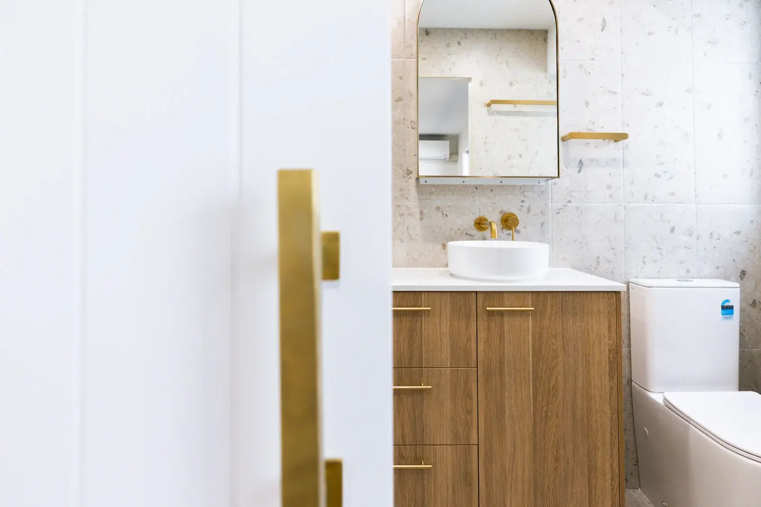 Completed bathroom renovation by Farr Constructions — new tiling, fixtures and modern finish
