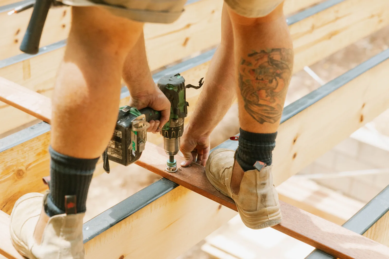 Drilling floor joists during Brisbane house extension substructure