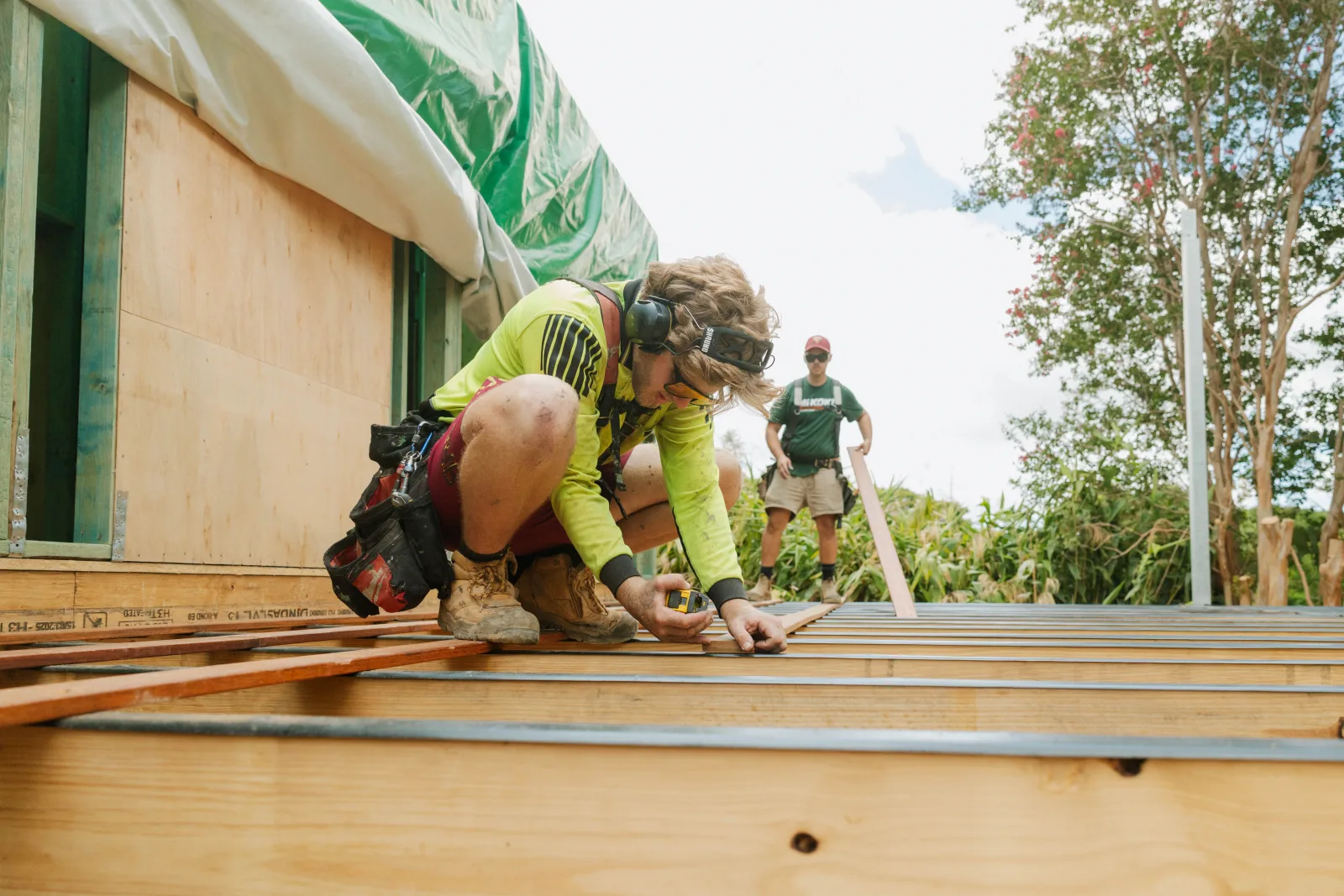 Team working on roof deck during second storey addition, Farr Constructions Brisbane