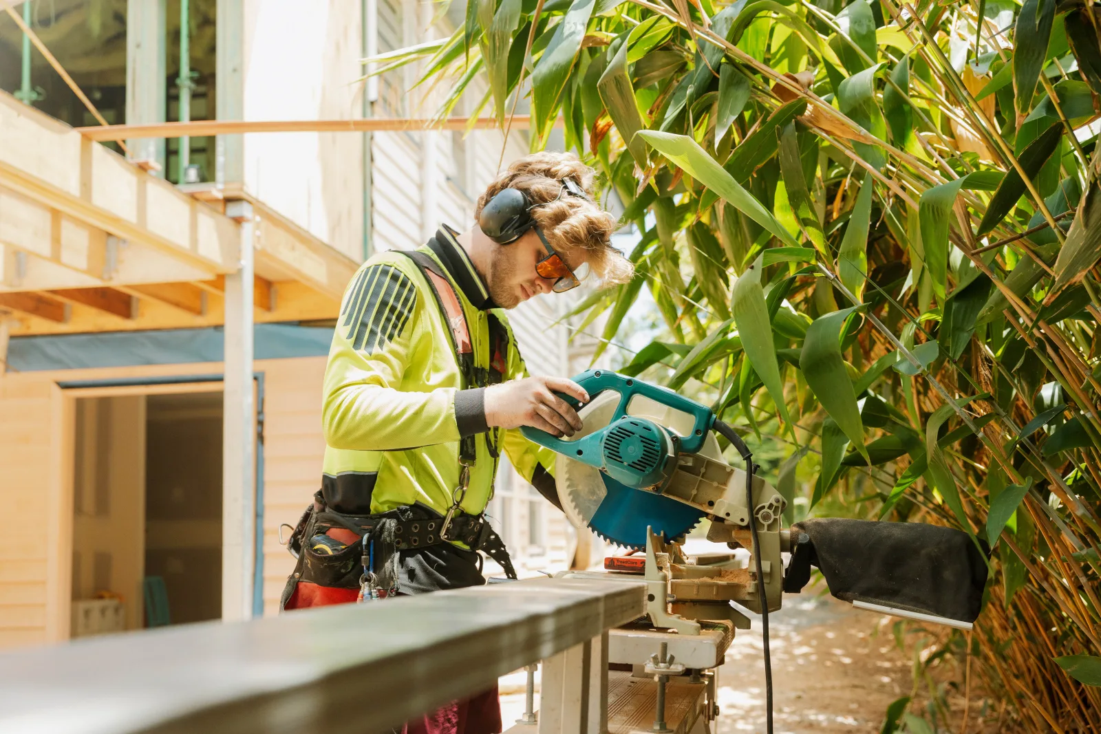 Carpenter cutting timber for new home Brisbane