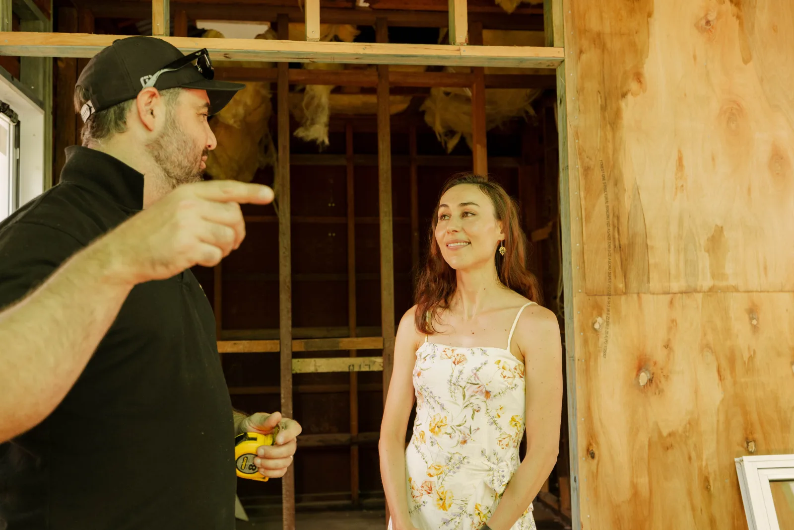 Tomas Farr discussing secondary dwelling plans with a client on site, Brisbane