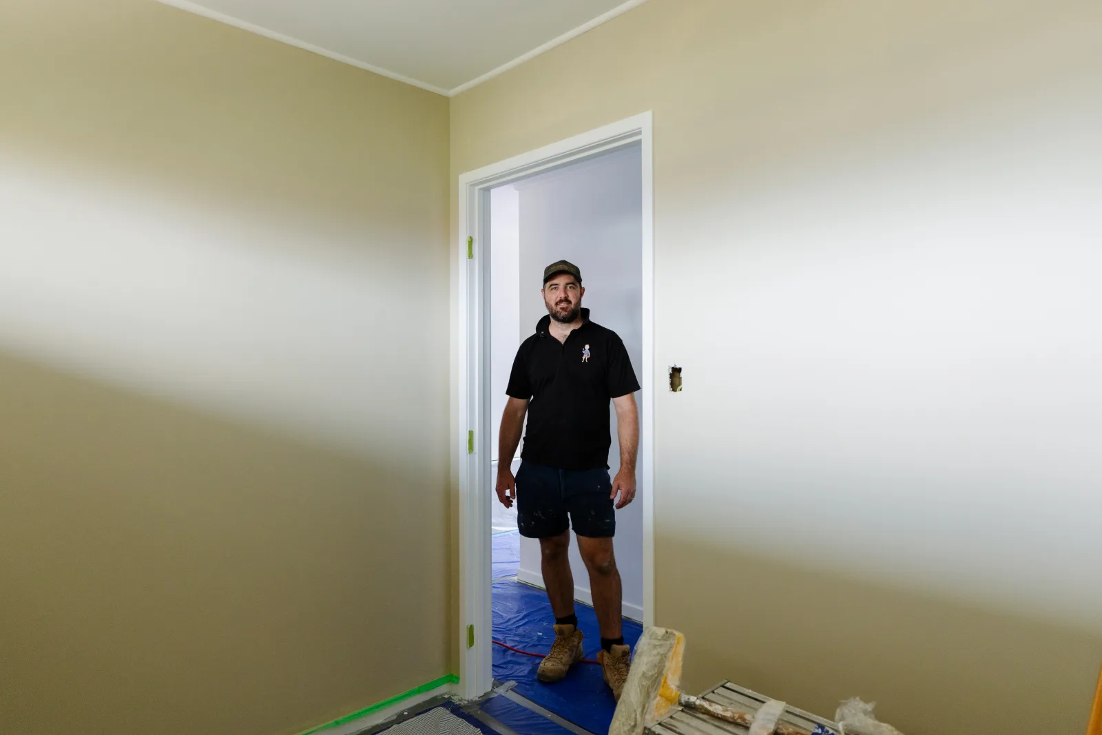 Tomas Farr inspecting completed renovation stage, Brisbane