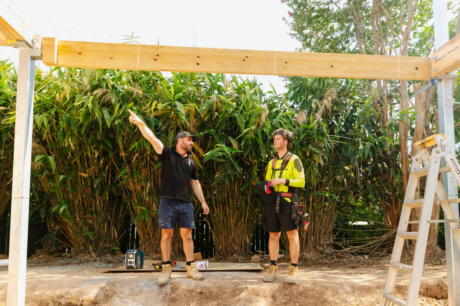 Tomas Farr with team during extension framing, Brisbane