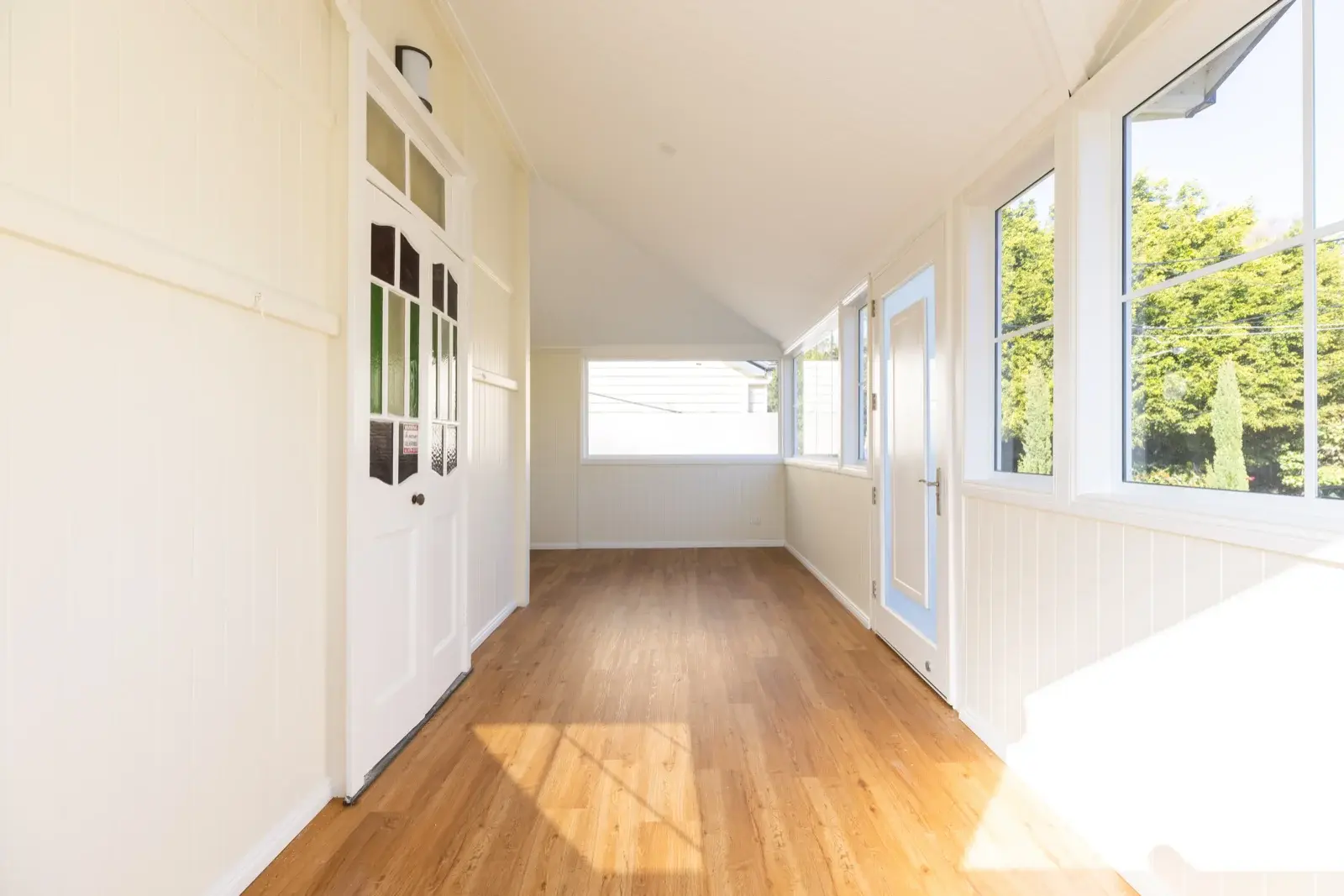 Finished Queenslander study — VJ sheeting walls and new vinyl plank flooring installed by Farr Constructions Brisbane