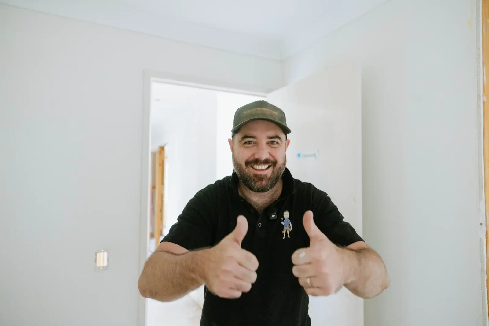 Tomas Farr giving thumbs up mid-build at Taigum home renovation — happy client, on time and on budget